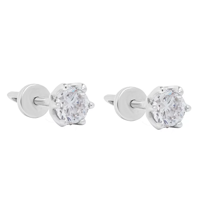 Сережки-гвоздики з білого золота з діамантом. Артикул 2109865202: ціна, відгуки, фото – купити в інтернет-магазині AURUM