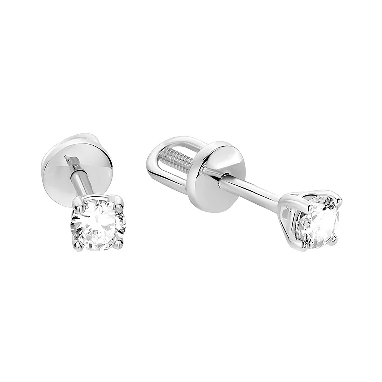 Сережки-гвоздики з білого золота з діамантами . Артикул 2107726202: ціна, відгуки, фото – купити в інтернет-магазині AURUM