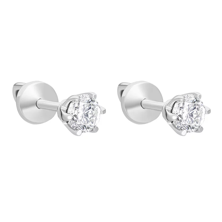 Сережки-гвоздики в білому золоті з діамантом. Артикул 2109768202: ціна, відгуки, фото – купити в інтернет-магазині AURUM
